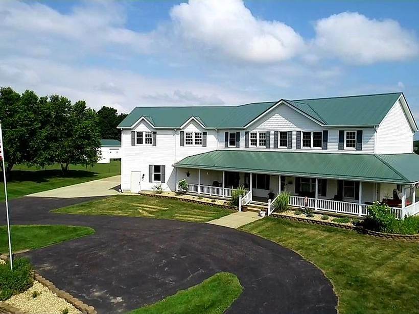 Steel Master Roofing install: Goshen, Standing Seam, Aged Copper