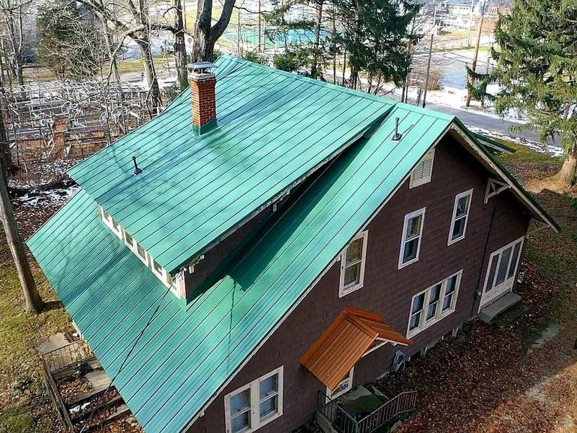 Steel Master Roofing install: Syracuse, Standing Seam, Ivy Green