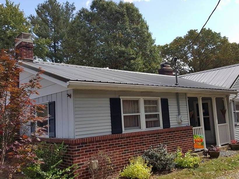 Steel Master Roofing install: Goshen, Rustic Red