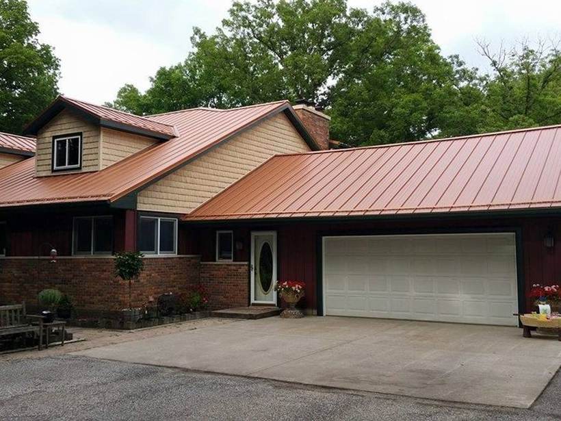 Steel Master Roofing install: Exposed Fastener