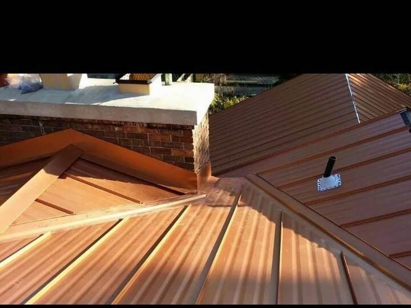 Steel Master Roofing install: Exposed Fastener