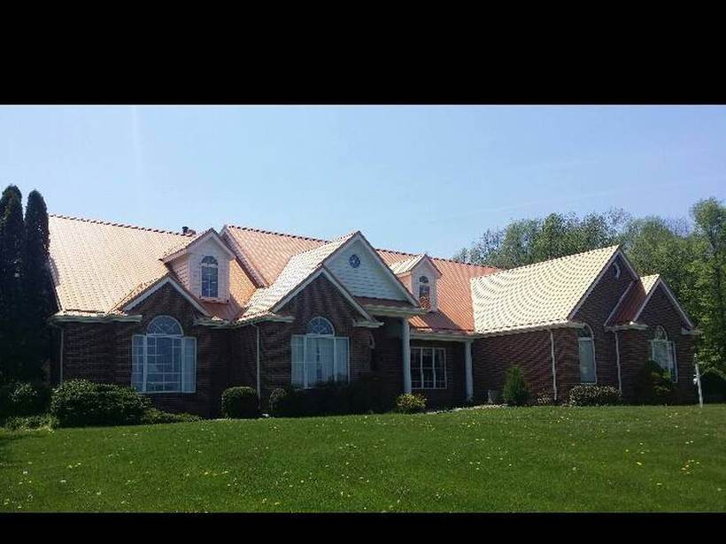 Steel Master Roofing install: Exposed Fastener