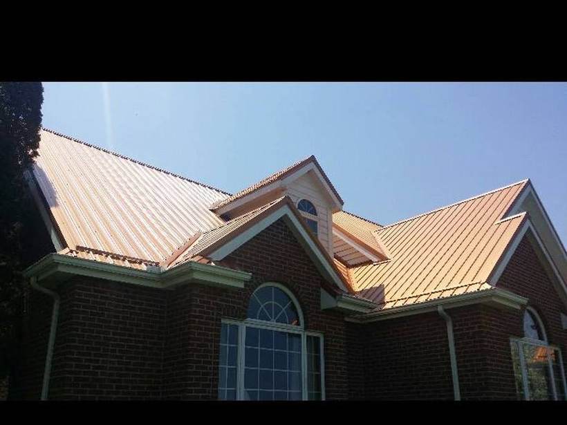 Steel Master Roofing install: Exposed Fastener