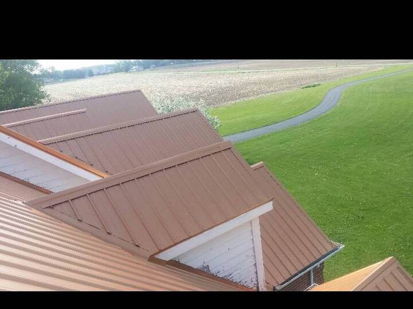 Steel Master Roofing install: Exposed Fastener