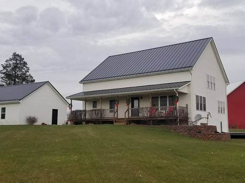 Steel Master Roofing install: Standing Seam