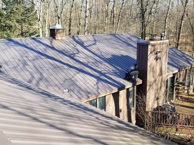 Steel Master Roofing install: Standing Seam