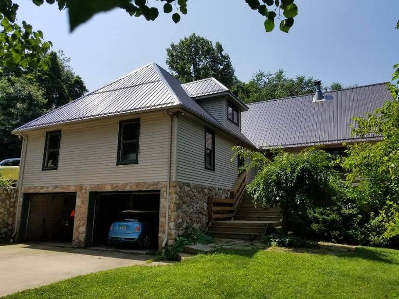 Steel Master Roofing install: Exposed Fastener