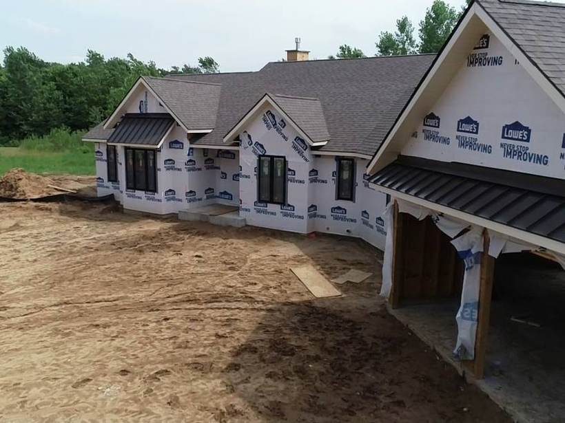Steel Master Roofing install: Standing Seam