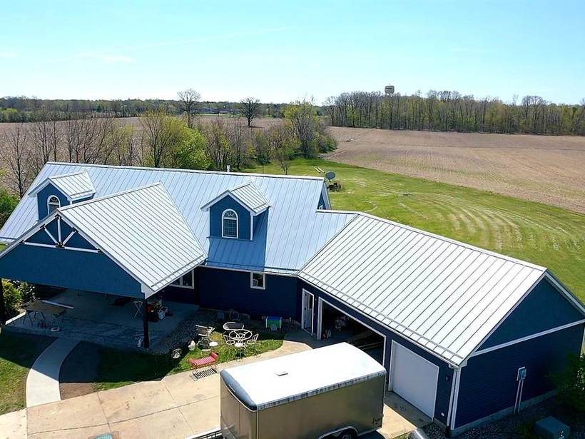 Steel Master Roofing install: Standing Seam