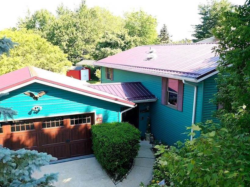 Steel Master Roofing install: Exposed Fastener