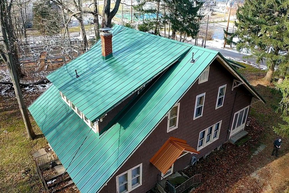 Steel Master Roofing install: syracuse - Standing Seam - copper penny