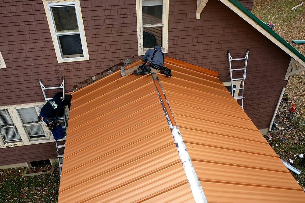 Steel Master Roofing install: syracuse - Standing Seam - copper penny