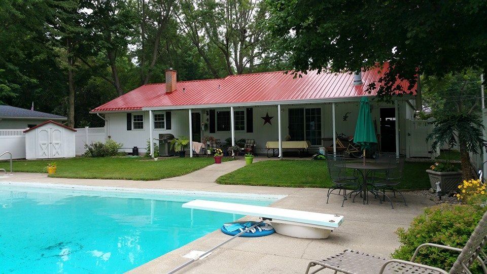 Steel Master Roofing install: goshen - Commercial - regal red