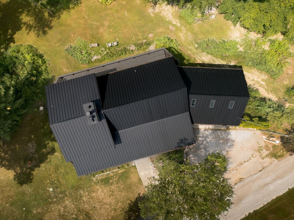 Steel Master Roofing install: Standing Seam