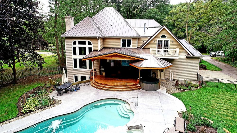 Steel Master Roofing install: Concealed Fastener - burnished slate