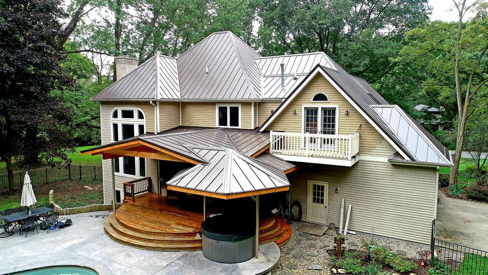 Steel Master Roofing install: Concealed Fastener - burnished slate