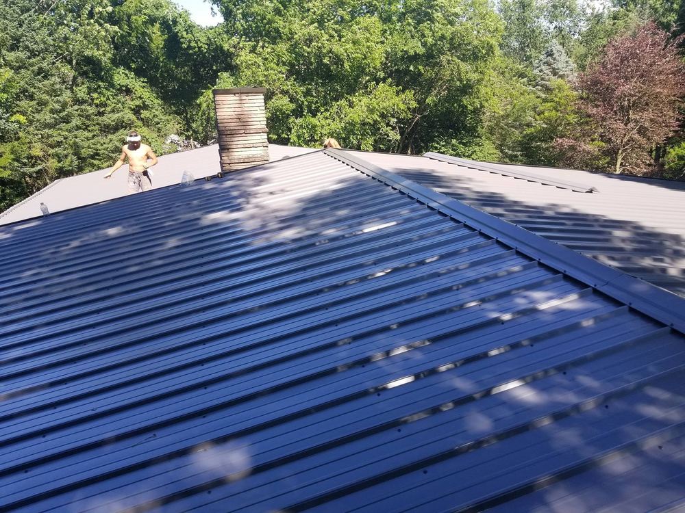 Steel Master Roofing install: niles - Exposed Fastener