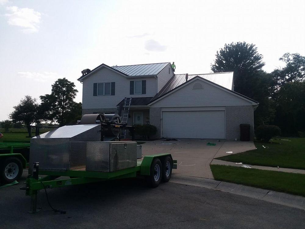 Steel Master Roofing install: Standing Seam - burnished slate