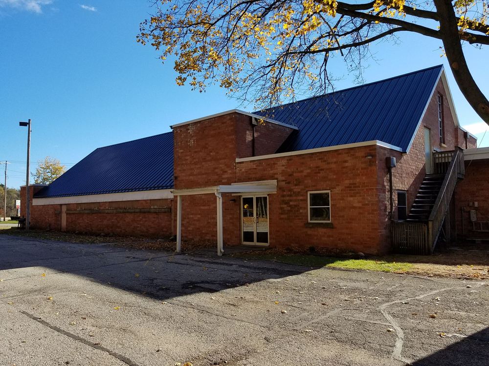 Steel Master Roofing install: Commercial - matte black