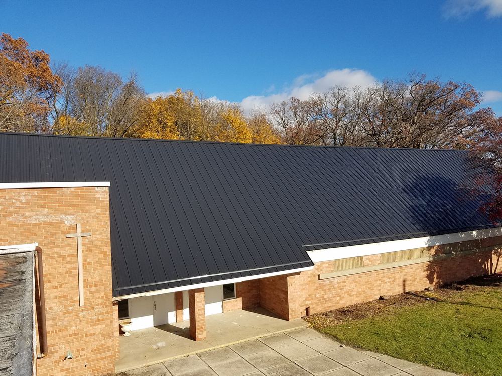 Steel Master Roofing install: Commercial - matte black