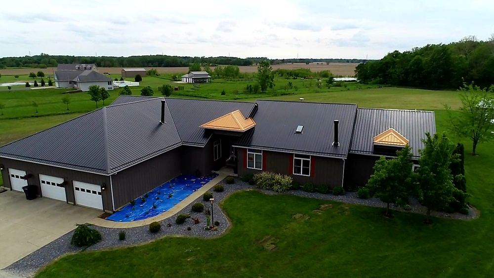 Steel Master Roofing install: Exposed Fastener - coal black