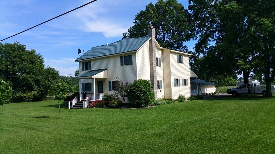 Steel Master Roofing install: middlebury - forest green