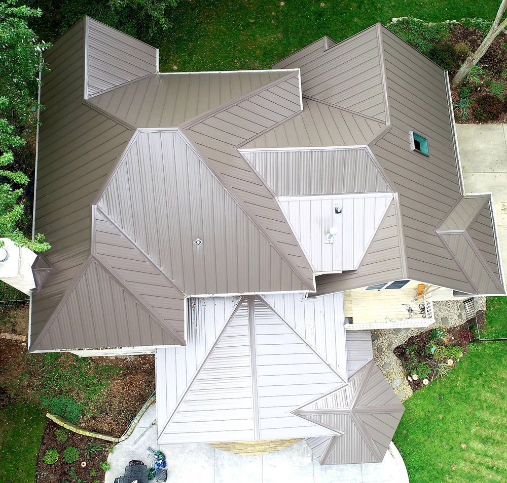 Steel Master Roofing install: Concealed Fastener - burnished slate